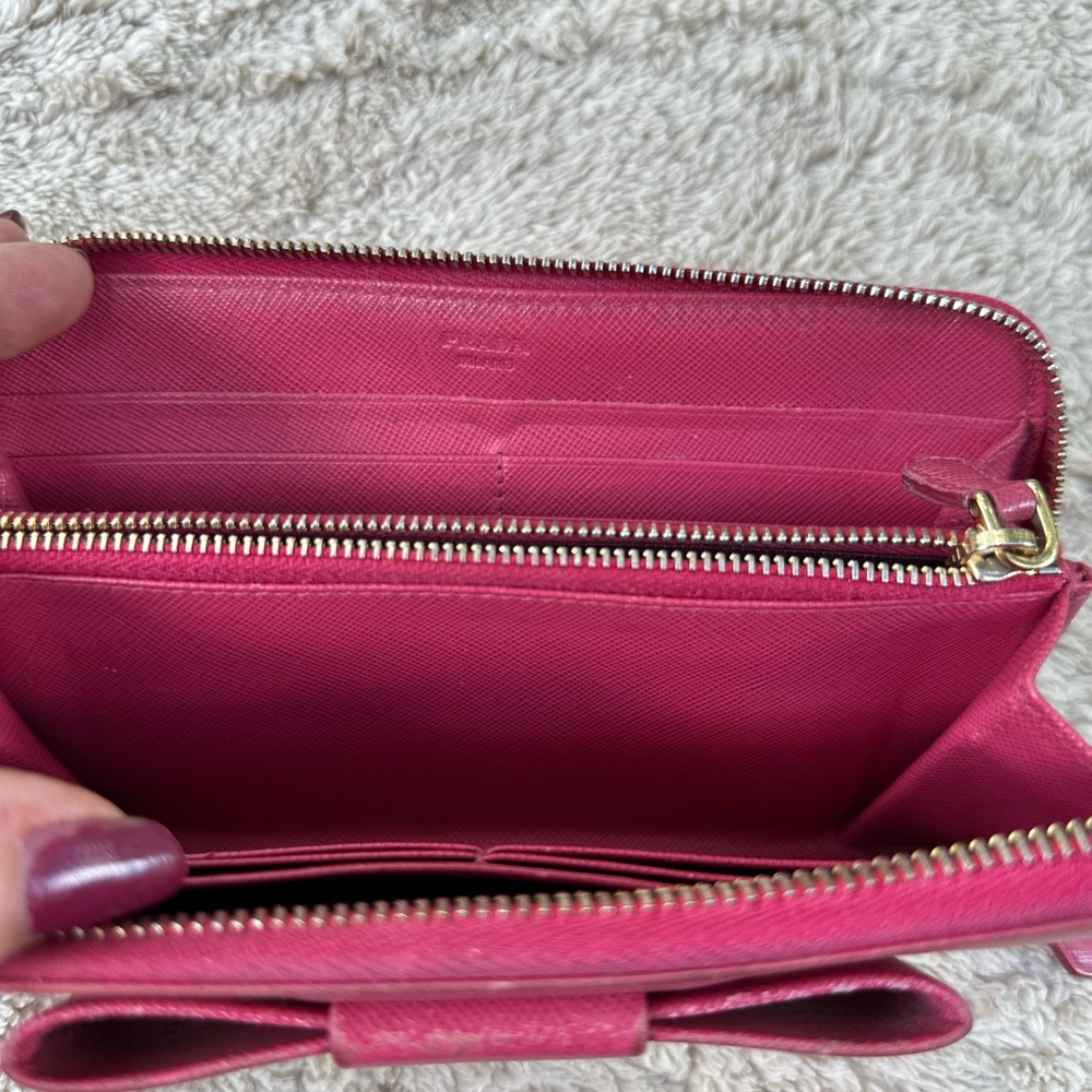 Prada Saffiano Bow Zip Around Wallet this is used please see all pictures - Picture 10 of 11